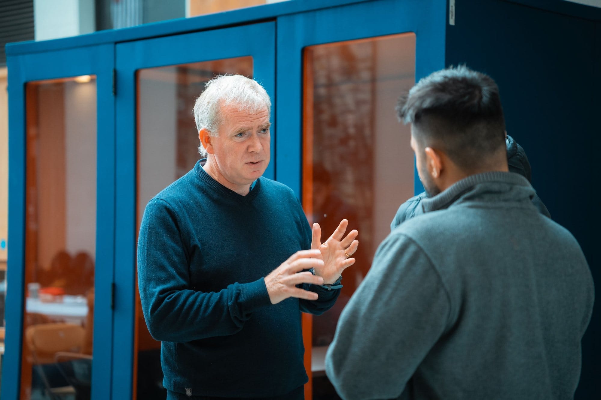 A mentor talking a participant through an idea at HackAthlone 2025