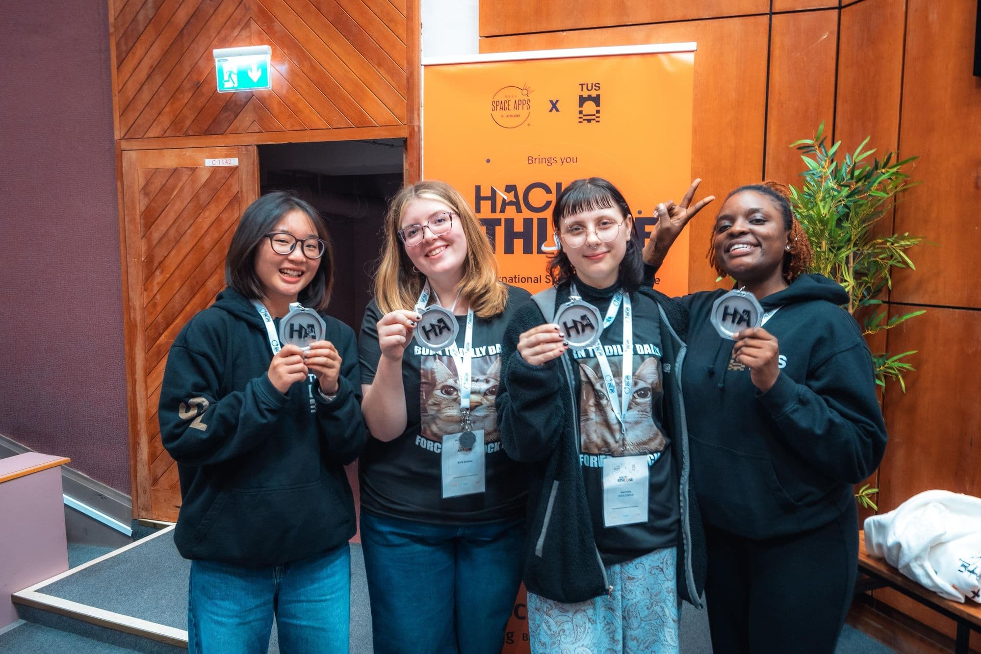 Team Dilly Dally, second place at HackAthlone 2025, holding their medals